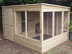 a small wooden shed with a dog in it