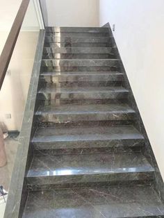 marble stairs leading up to the second floor