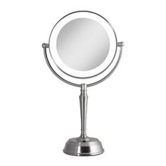 a round mirror sitting on top of a metal stand in front of a white background