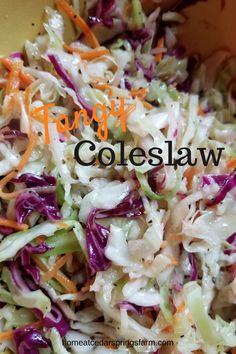 this coleslaw salad has carrots, cabbage, and red cabbage in it