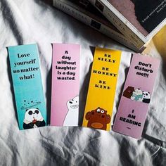 four bookmarks with cartoon characters on them