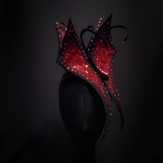 Red and Black Double Butterfly Headdress This unique headdress features a red and black sequined butterfly, lined with rhinestones, which sits mirrored from each other over a headband. A touch of this avant-garde style gives a dramatic look for any occasion. The lightweight design is wired with galvanized steel and allows the wearer to gently bend or adjust the butterflies and headband to fit the wearer perfectly. **ALL SALES FINAL** **Fast shipping from Los Angeles, CA** Visit and follow @madame_moes on Instagram to see more artwear. Red Carnival Costume Hats And Headpieces For Party, Red Carnival Party Costume Hats And Headpieces, Fitted Costume Hats And Headpieces For Holiday Party, Fitted Party Costume Hat With Tall Crown, Fitted Headpieces For Evening Carnival, Fitted Costume Hats For Carnival Masquerade, Fitted Masquerade Costume Hats For Carnival, Fitted Red Costume Hats And Headpieces For Costume Party, Red Tall Crown Costume Hat For Party