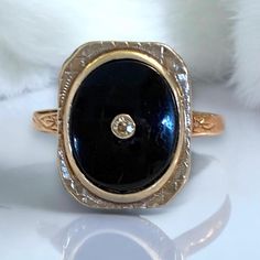 LOVELY Antique Art Deco 10k Yellow Gold Black Onyx Diamond Ring Size 4 * Size 4 * 11mm x 9.5mm large oval black onyx with a small round diamond in center. Set in a fancy rectangular setting! * Hallmark faded, but is 10k gold * Weighs 2.8 grams. * In excellent vintage condition! Shipped FAST AND FREE, fully insured and gift boxed :) I guarantee item to be as described and pictured : ) Onyx Diamond Ring, Antique Jewelry Rings, Antique Art Deco, Antique Rings, Antique Art, 10k Gold, Metal Rings, Vintage Watches, Gold Black