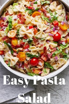 an easy pasta salad with tomatoes and lettuce