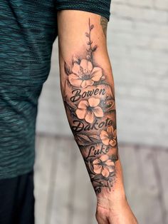 a person with a flower tattoo on their arm