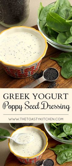 greek yogurt poppy seed dressing in a bowl with spinach leaves and spoons