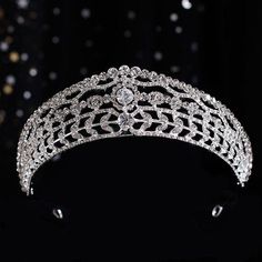 24 Types of wedding tiaras for selection The mysterious and romantic bridal tiara is an indispensable accessory for special occasions such as weddings. The sense of fantasy, timelessness, and ritual that the wedding crown represents means that it never goes out of style. There are 24 gorgeous bridal tiaras to choose from diamond bridal crown to pearl bridal crown. There's always one wedding tiara for you. Choose your proper wedding crown A wedding crown for bride is definitely a statement piece, Small Wedding Tiara, Crown For Wedding, Crown For Bride, Crown Diamond, Wedding Tiaras, Bridal Tiaras, Pearl Bridal, Wedding Tiara, Bridal Crown