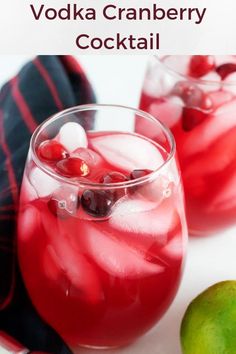 two glasses filled with vodka cranberry cocktail