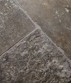 an image of a stone floor that looks like it has cracks in it