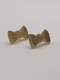 Bling Bow Earrings, Gold Bow Earrings, Silver Bow Earrings, Stud Earrings, Stud Bow Earrings Get ready to sparkle and shine with our bling bow earrings! Each pair is carefully crafted to add a touch of fun and cuteness to any outfit. These earrings are shiny and eye-catching, making them the perfect accessory for any occasion. Add a little bling to your life with our bling bow earrings! 20mm long, 13 mm wide, Nickel Free, Cadmium Free, Lead Free Bling Bows, Cute Stud Earrings, Silver Bow, Bow Earrings, Earrings Stud, Earrings Silver, Bling Bling, Earrings Gold, Jewelry Earrings Studs