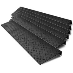 four pieces of black diamond plate on white background