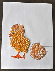 a paper cut out of corn and a chick