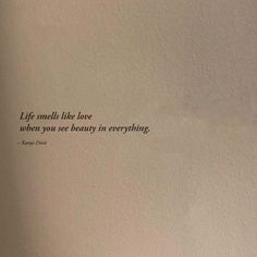 an open book with the words life smells like love when you see beauty in everything