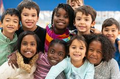 a group of young children posing for a photo together stock photo and royalty - all images are