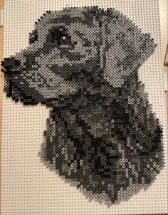 a black and white dog made out of legos