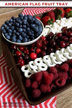 an american flag fruit tray with berries and marshmallows