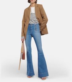 Sheridan High Rise Flared Jeans in Blue - Veronica Beard | Mytheresa Fall Wide Leg Flare Jeans With Button Closure, Trendy Flare Jeans With Button Closure For Fall, Trendy Fall Flare Jeans With Button Closure, Fall Flare Jeans With Five Pockets, Flare Jeans With Five Pockets For Fall, Trendy Flared Hem Jeans For Fall, High Rise Flare Jeans With Button Closure For Work, High Rise Flare Jeans With Button Closure For Fall, Mid-rise Flare Jeans With Button Closure For Fall