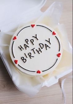 a birthday cake with the words happy birthday written on it