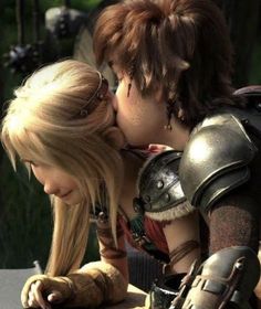 two people in armor are kissing each other