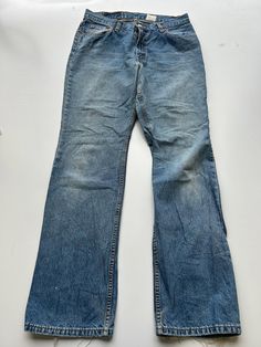 Mens Levi Levis Strauss 550 series Jean  1990s vintage  Baggy Fit  Zip Fly  Mid Stonewash Blue  Waist 31 inch Leg Length 32 inch 'Measurements are exact measurement of garmet' Item in excellent condition Levis Strauss, Levi Strauss Jeans, Levis Men, Levi Strauss, Baggy Fits, Levis Jeans, Halloween Shopping, Mens Jeans, Levi's