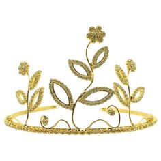 A stunning Vintage Gold & Crystal Flower High Tiara from the 1990s. Crafted in gold tone metal and claw set with a myriad of chaton cut rhinestones. A grand tiara depicting a trio of tall flowers at the front with a stone set band for continuity. Enjoy the age old tradition on your wedding day with this emblem that signifies the crowning of love. In very good vintage condition, adjustable head band, approx. 13.5cms wide and 8cms. high. A stunning high tiara that will look utterly glamourous and Tall Flowers, Glass Gems, The 1990s, Gold Crystal, Head Band, Vintage Jewels, Crystal Flower, Rhinestone Jewelry, Timeless Treasures