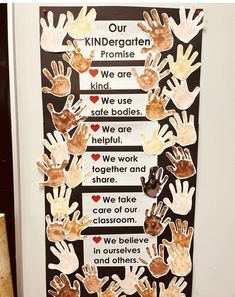 a bulletin board with handprints on it that says our children are safe bodies