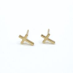 These pretty cross studs are available in 14k yellow or white gold. Our delicate take on this meaningful symbol will quickly become your everyday go-to earrings. available as a single stud or pair stud earring with butterfly backing all material is 14k gold approx. 3/8" tall by 1/4" wide  weight is .86 grams per pair including post & backing Pretty Cross, Cross Stud Earrings, Tiny Tags, Cross Earrings Studs, Summer Ideas, Gold Cross, Sterling Silver Studs, Sterling Silver Earrings Studs, Stud Earring