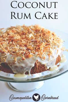 a close up of a cake on a plate with the words coconut rum cake above it