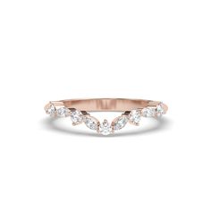 a rose gold ring with three diamonds