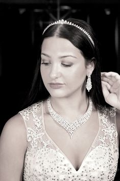 BELLA TIARA INTRODUCES OUR ROYAL JEWELRY COLLECTION Every piece is made to perfection, we only use the finest CZ diamond like cubic zirconia for that dazzling and dramatic look and always at a fraction of the price of any bridal boutique. Make a statement with our Beautiful Glamorous and bold AAA quality high end CZ statement necklace set, 2 1/4" bold and dazzling drop pierced earrings.free matching bracelet approx 6 3/4" long small to standard length free14k white gold electroplated ----------- Dazzling Silver Diamond Jewelry Sets, Exquisite Silver Jewelry Sets With Diamond Accents, Silver Crystal Jewelry Sets With Elegant Design, Dazzling Silver Jewelry Set With Sparkling Stones, Exquisite White Gold Crystal Jewelry Sets, Exquisite White Gold Jewelry Sets With Crystal, Glamorous Sterling Silver Wedding Necklace, Elegant Sparkling Jewelry Sets For Party, Elegant Diamond White Jewelry Sets For Parties