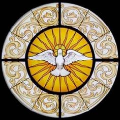 a stained glass window with a dove on it's side and swirls in the middle