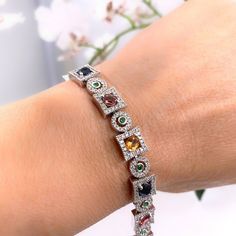 Sapphire & Diamond Bracelet Style: Multi-Color Sapphire & Diamond Link Bracelet Metal: 14K White Gold, 22.62 grams Size: 7.25'' long Sapphires: 12 Oval Cut, 12 Round Cut Color: Blue, Pink, Yellow, & Green Accent Diamonds: 384 Round Brilliant Cut  Hallmark: 14K GC3 Includes: Certified Appraisal, Elegant Bracelet Box Sku#OFCBRIVS1VS2-7.00TCWRBD4.00TCWR9850 Return Policy: Returns accepted up to 14 days. Payment Information: We accept payment by PayPal International Buyers: Buyer is responsible for Elegant Multicolor Diamond Bracelet For Formal Occasions, Multicolor Multi-stone Diamond Bracelet For Formal Occasions, Elegant Multicolor Diamond Bracelet, Multicolor Diamond Bracelet With 17 Jewels, Luxury Multicolor Tennis Bracelet For Anniversary, Multicolor Diamond Bracelet For Formal Occasions, Multicolor Luxury Diamond Bracelet For Formal Occasions, Luxury Multicolor Diamond Bracelet For Formal Occasions, Formal White Gold Multi-stone Tennis Bracelet