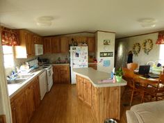 the kitchen is clean and ready to be used for cooking or dining room furniture, as well as new appliances