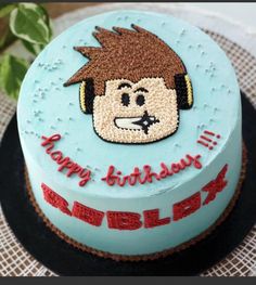 a birthday cake decorated with an image of a monkey