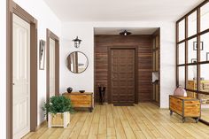 an empty room with wooden floors and large windows on either side of the door is a potted plant