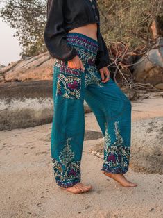 Turquoise yoga trousers with mandala and paisley pattern * Made from 100% rayon * Lightweight and comfortable * Elasticated ankles and waistband   *XS Length - 40"/ 100cm Waist - 20"/50 - 40"/100cm * Small Length - 40"/ 100cm Waist - 22"/ 57cm - 44"/ 111cm * Medium/Large Length - 40"/ 101cm Waist - 30"/ 76cm - 53"/134cm * XS fir most UK ladies sizes 4-8 (US 0-4) * Small fit most UK ladies sizes 6-10 (US 2-6) * Medium/Large fit most UK ladies sizes 12-16 (US 8-12) Zumba Pants, Yoga Trousers, Sports Pants Women, Thai Silk, Womens Trousers, Camping Outfits, Wide Pants, Paisley Pattern, Sport Pants