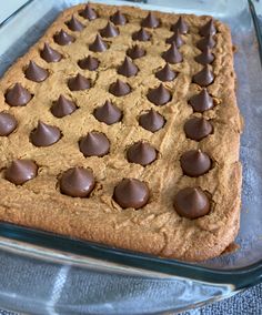 a chocolate chip cookie in a glass baking dish