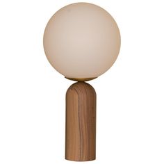 a white ball sitting on top of a wooden pole next to a light brown stick