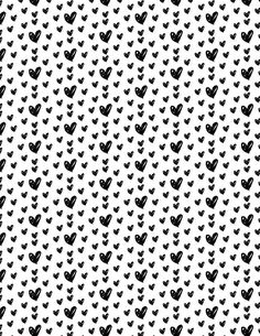 an abstract black and white pattern with hearts