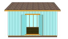 a small blue shed with a brown roof