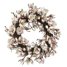 a white wreath with pink flowers on it