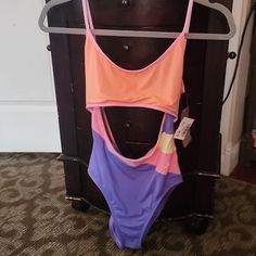 Nwt Never Worn However, The Protective Film Is Removed Super Cute Fun Summer Pastel Pallet With Flirty Midriff Cut Out Durable Strong Material That Will Stay In Place Size Small Fits Roughly A 32a-34b Purple Summer One-piece Bodysuit, Purple One-piece Beachwear Bodysuit, Purple One-piece Summer Bodysuit, Purple One-piece Bodysuit With Lined Body, Purple One-piece Lined Bodysuit, Summer Sleeveless Purple Bodysuit, Fitted Purple Color Block Swimwear, Casual Purple One-piece Swimwear, Pastel Pallet