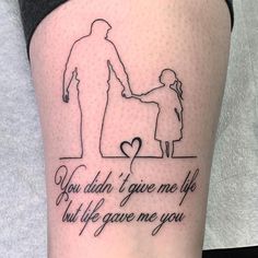 a woman with a tattoo on her leg that says, you didn't give me life but if gave me you