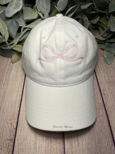 Perfect for the pool, beach, ball field, a rainy day, or EVERY day! Our beautiful hats are a perfect addition to any wardrobe. Unisex sizing. White Adjustable Snapback Sun Hat, White Adjustable Summer Baseball Cap, White Summer Snapback Baseball Cap, White Snapback Baseball Cap For Summer, Beach Trucker Hat With Embroidered Logo And Curved Brim, Trucker Hat With Embroidered Logo For Beach, Adjustable Beach Baseball Cap With Embroidered Logo, Cute Hats With Embroidered Logo And Curved Brim, Cute Cotton Outdoor Hat