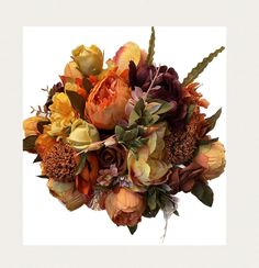 an arrangement of flowers is displayed on a white background