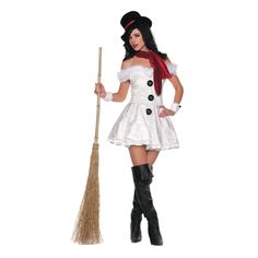 a woman in a white dress holding a broom