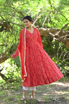 PRODUCT DESCRIPTION :-Time to Flaunt you 'Desi side' with this beautiful red Bhandej anarkali.Anarkali :- Reyon cottonPant :- CottonDupatta :- ChiffonColor:-Anarkali and dupatta - Red Pant - Off whiteCare Instructions :- Dry clean onlyModel Size :- Model is wearing XS sizeModel Height :- 5.6''DISCLAIMER :- Slight color variations may occur due to different screen resolution. Bandhani Anarkali, Red Pants, Pakistani Outfits, Cotton Pants, Anarkali, Desi, Color Variations, Chiffon, Dry Clean