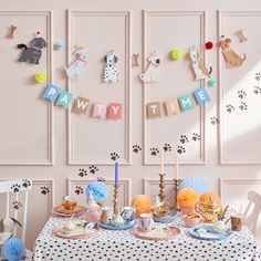 a dog themed birthday party with decorations and food