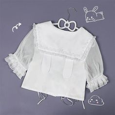 Puff-Sleeve Lace-Up Blousemeasurement is cm.Product Information Material: 95% Polyester Color: White Cute Blouse With Lace Doll Collar, White Puff Sleeve Top With Lace Collar, Puff Sleeve Blouse With Lace Collar For Spring, White Lantern Sleeve Top With Lace Trim, White Lantern Sleeve Tops With Lace Trim, White Puff Sleeve Blouse With Ruffles, Fitted Puff Sleeve Tops With Lace Collar, Fitted Tops With Lace Collar And Puff Sleeves, White Padded Blouse With Lantern Sleeves