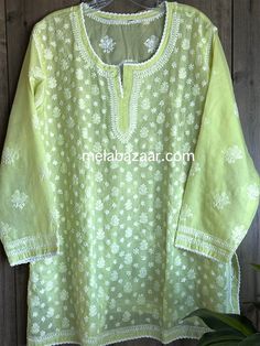 "Soft cotton Chikankari hand embroidered blouse. Matching liner Included. Length: 30 inches \"Embroidery designs vary \"" Luxury Cotton Chikankari Embroidered Top, Green Bollywood Blouse With Chikankari Embroidery, Green Blouse With Chikankari Embroidery For Transitional Season, Chikankari Embroidered Top For Festivals, Festive Chikankari Embroidered Straight Kurta Top, Anarkali Pista Green Blouse With Chikankari Embroidery, Diwali Chikankari Embroidery Blouse In Pista Green, Diwali Pista Green Blouse With Chikankari Embroidery, Traditional Chikankari Embroidered Top For Festive Occasions